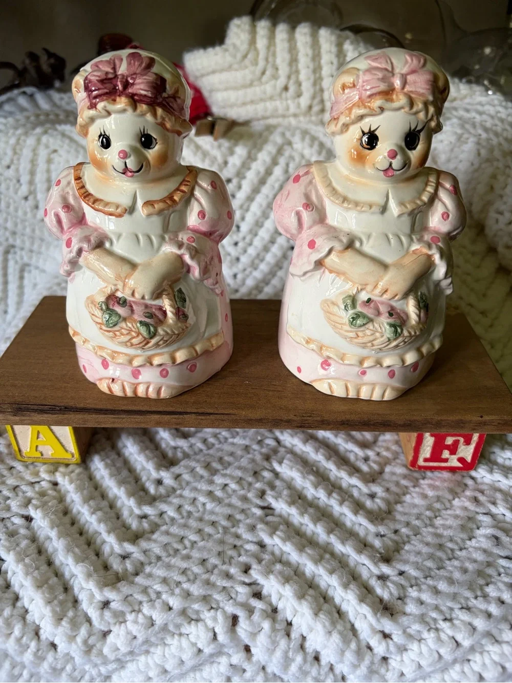 Pair of vintage ceramic bear figurines dressed as grandmothers with baskets
